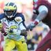 Michigan senior quarterback Denard Robinson runs the ball during the second half of the Outback Bowl at Raymond James Stadium in Tampa, Fla. on Tuesday, Jan. 1. Melanie Maxwell I AnnArbor.com